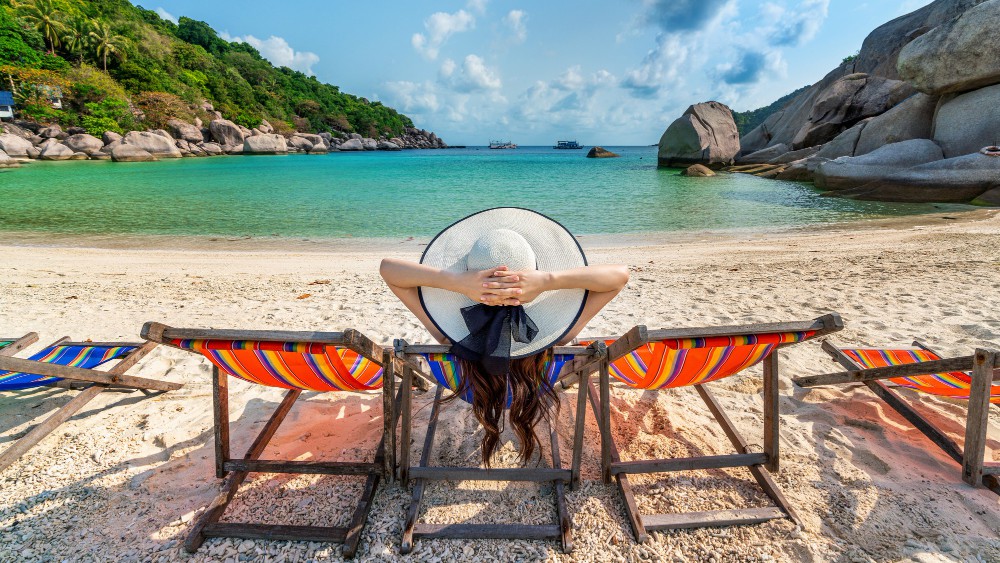 woman-with-hat-sitting-chairs-beach-beautiful-tropical-beach-woman-relaxing-tropical-beach-koh-nangyuan-island