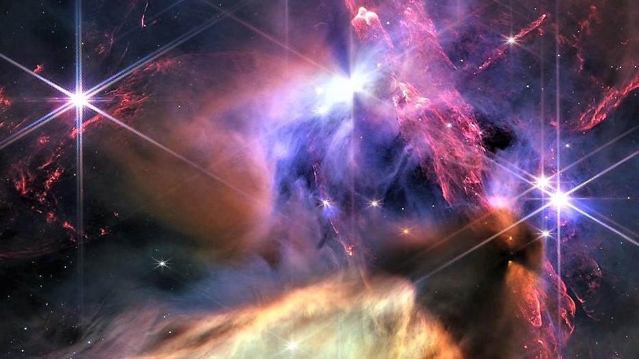 Jedinečný snímek nově zrozených hvězd. Teleskop pronikl do jejich porodnice