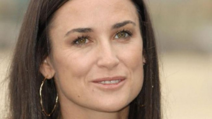 Žaloba Mooreové na australský časopis skončila mimosoudní dohodou