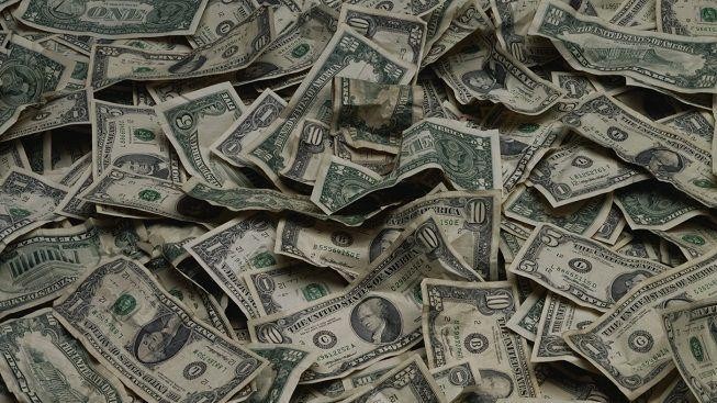 Akcie v USA díky statistice a Applu rostly, dolar posílil