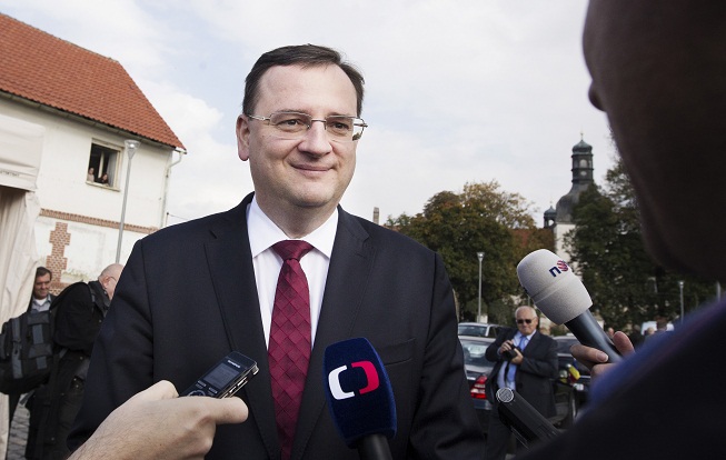Mediální odborníci srovnali vystupování Nečase a komunistů