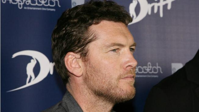 Herec Worthington napadl fotografa, který kopl jeho partnerku