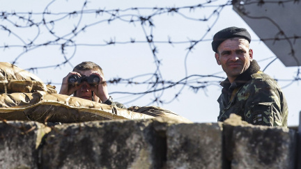 Ukrajinští 'diverzanti' vtrhli na Krym a zabili dva naše vojáky, tvrdí Putin a vyhrožuje Kyjevu