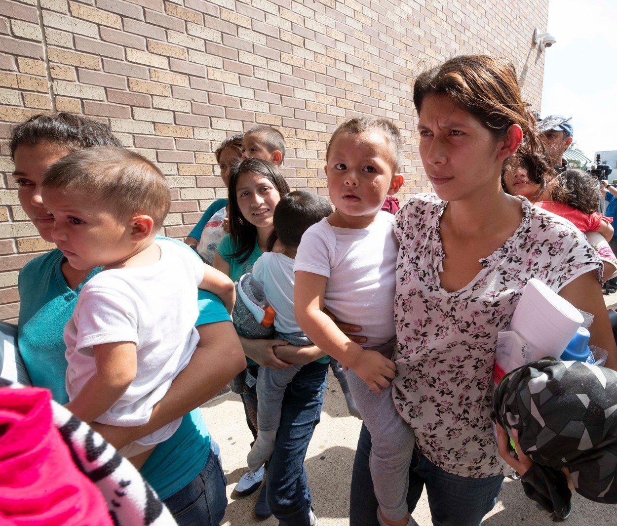 Jak plačící děti migrantů donutily dřevorubce Trumpa k ústupu