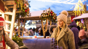 happy-smiling-lady-poses-street-holiday-fair-holding-lollipops-her-hands