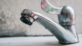 close-up-water-dripping-from-faucet