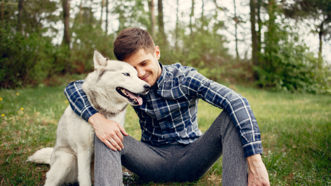 handsome-guy-summer-park-with-dog