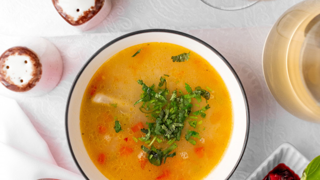 top-view-chicken-soup-bowl-served-with-feijoa-kompot-bread