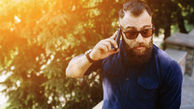 close-up-man-using-his-smartphone