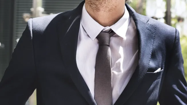 business-man-contemplating-outdoors-concept